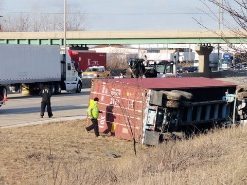 On March 19, 2013 a semi truck rolled over into a ditch after crashing with a passenger vehicle on the westbound I-80 in Frankfort, IL Photo credit: Nick Swedberg