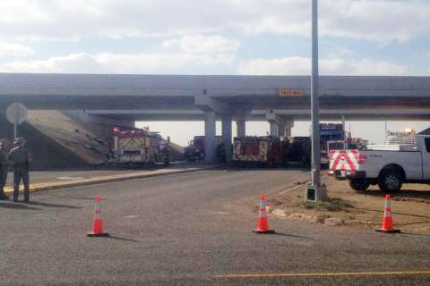 A southbound tractor trailer hauling batteries on I-27 drove off an overpass and landed on the roadway below in New Deal, TX about 12 miles north of Lubbock. Photo credit: Avalanche-Journal