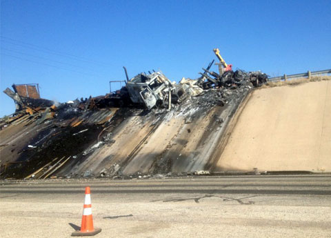 Charred wreckage of two semi trucks after a fiery fatal collision with an SUV going the wrong way on I-20 between Penwell and Odessa, TX on April 4, 2013. Photo credit: Tom Michael / KXWT