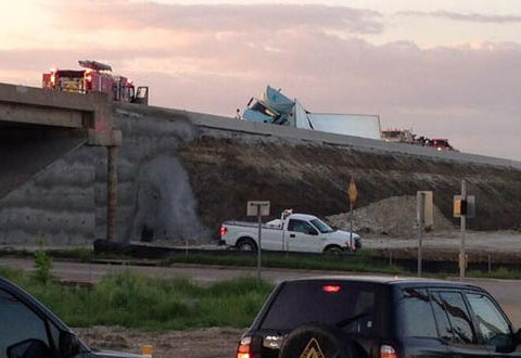 A semi truck rolled over on U.S. Highway 75 near University Dr. in McKinney, TX spilling 50,000 lbs of cake mix and holding up traffic for hours on April 25, 2013. Photo credit: Keaton Fox, NBC 5