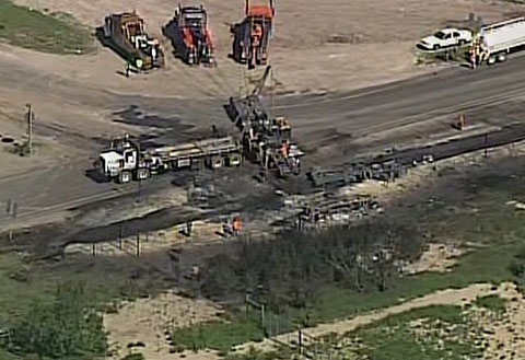 One trucker was killed when two semi trucks collided in a fiery crash in Fowlerton, TX on June 19, 2013. Photo credit: News 4 San Antonio.