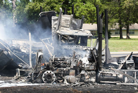 Two semi trucks collided and burst into flames in a fiery wreck on U.S. Highway 59 in Lufkin, TX on June 26, 2013. Photo credit: Andy Adams/The Lufkin News.