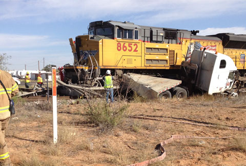A semi truck got stuck at a rail crossing in Midland, TX and crashed with a Union Pacific train on October 10, 2013. Photo credit: CBS 7 News.