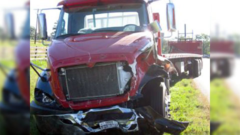 A semi truck collided with a passenger car in Montgomery, TX on October 24, 2013. Photo credit: Russell Ledbetter / The Courier